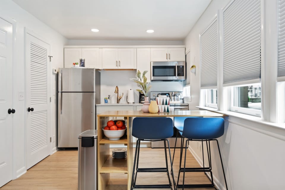 The kitchen is well-equipped with cooking and baking necessities