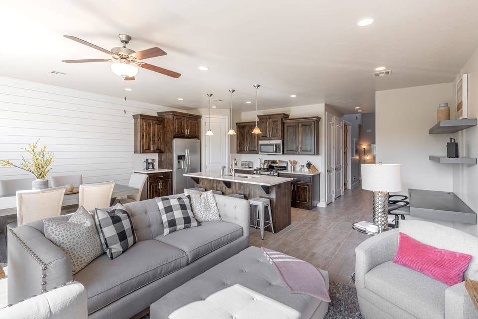 Living Room Area - The Living Room is conveniently located adjacent to the Kitchen and Dining Table and is a great place for entertaining guests during downtime.
