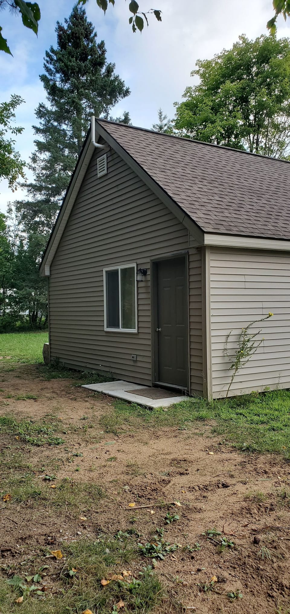 Cabin entrance is located on the north side of the building.