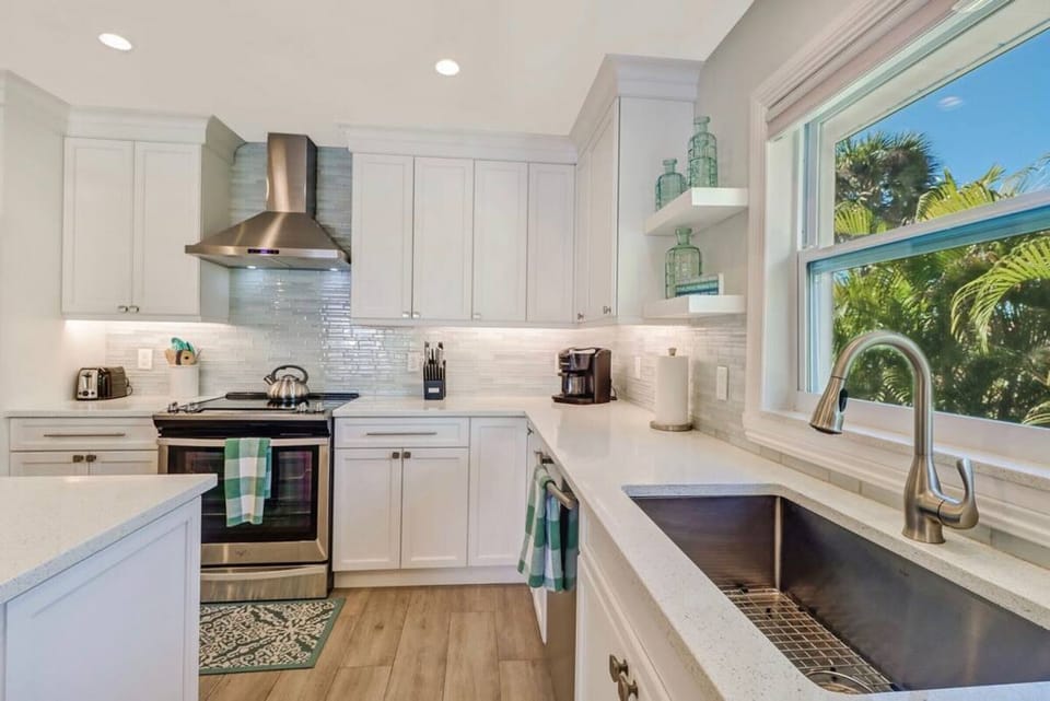 Kitchen with extra deep trough sink and Keurig Duo coffee pot.