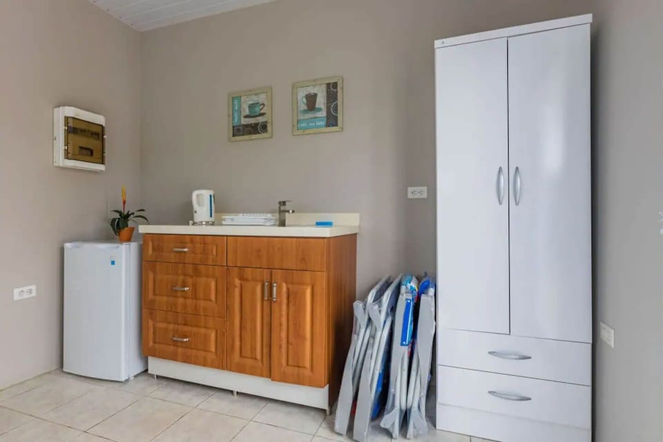 Washing machine, sink and ward robe with enough storage.