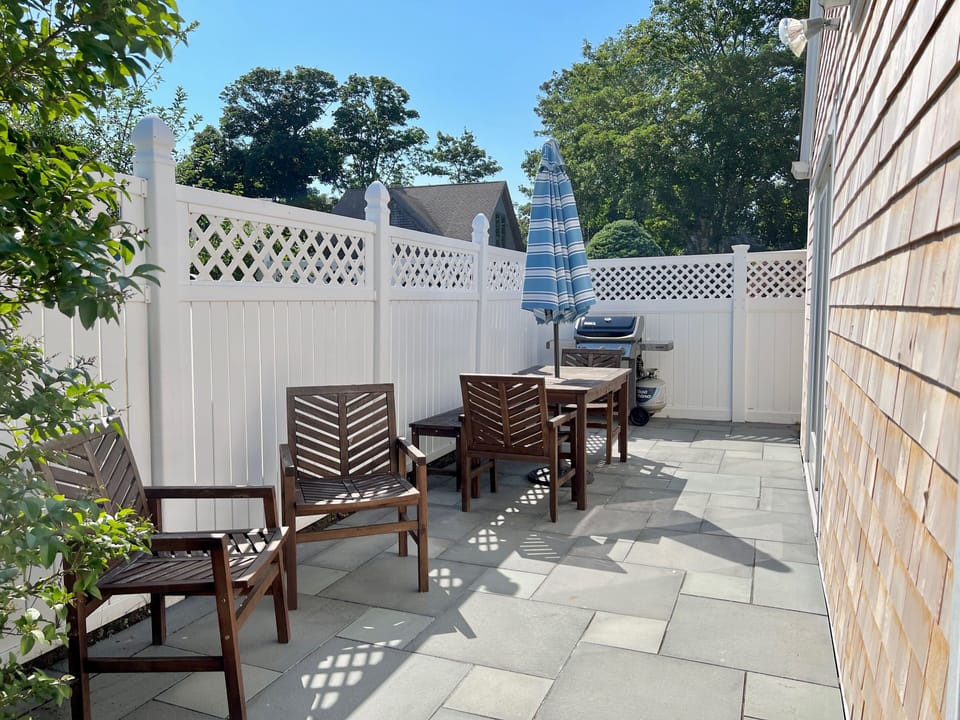 Private back patio with BBQ grill