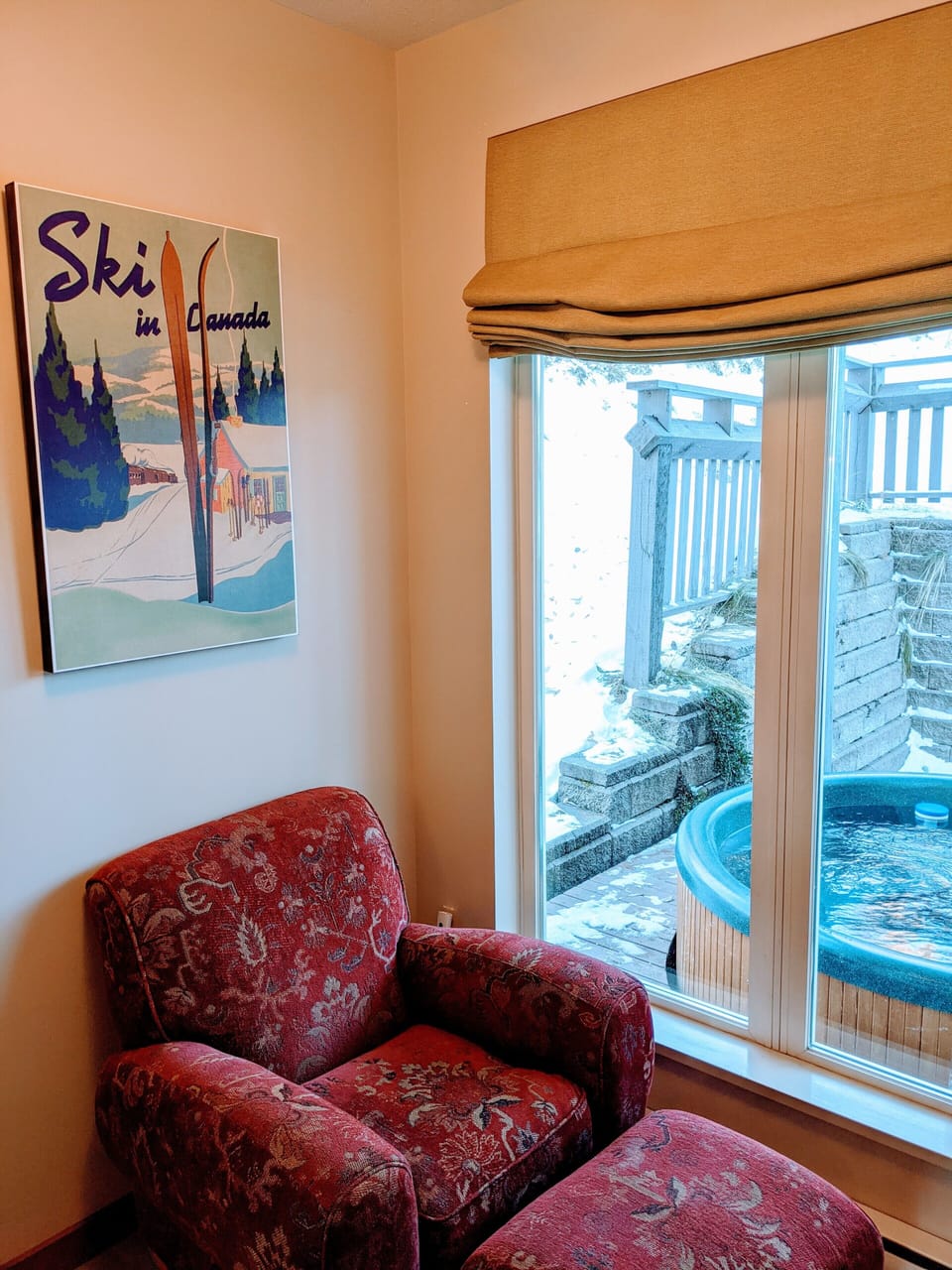 Cozy reading nook by back door overlooking deck. 