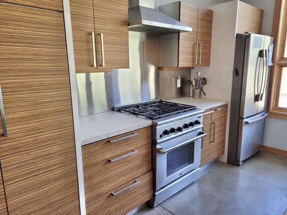 This home has a well equipped modern kitchen with a professional gas range.