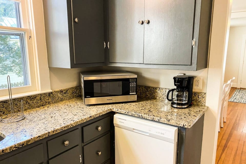 New appliances include a dishwasher, coffeemaker, toaster oven and microwave.