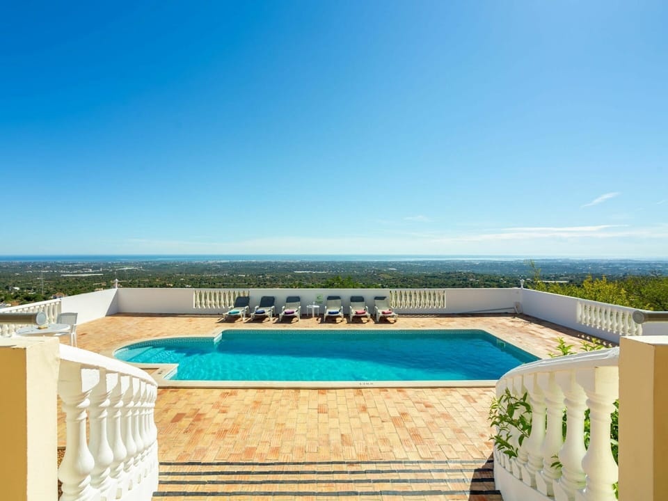 Water, Sky, Property, Building, Swimming Pool, Azure, Rectangle, Architecture, Outdoor Furniture, Shade