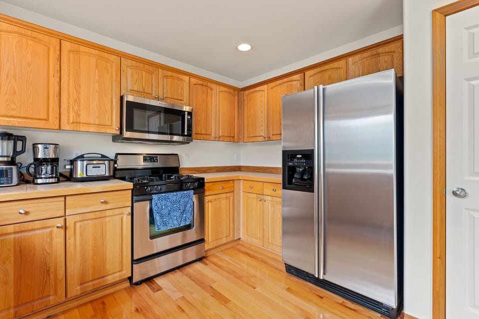 KITCHEN W SS APPLIANCES, 2 FULL-SIZE REFRIGERATORS