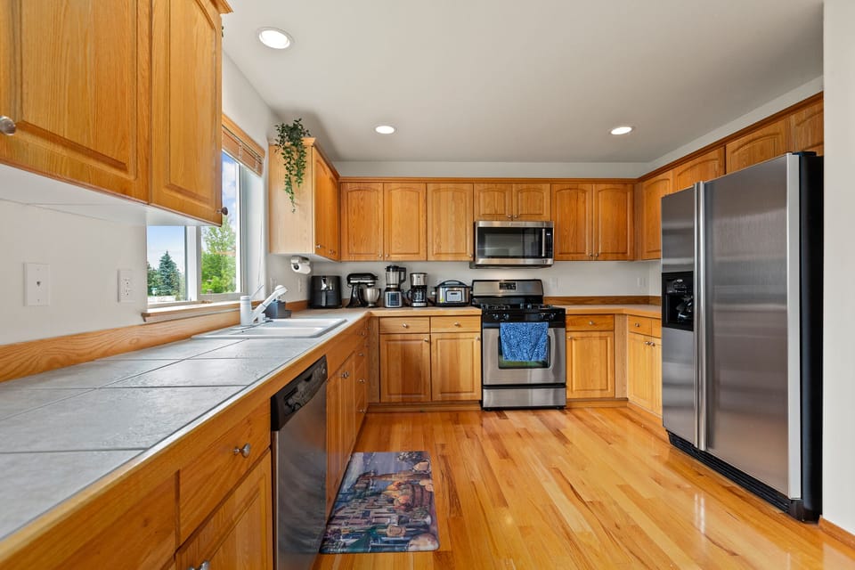 KITCHEN W SS APPLIANCES, 2 FULL-SIZE REFRIGERATORS