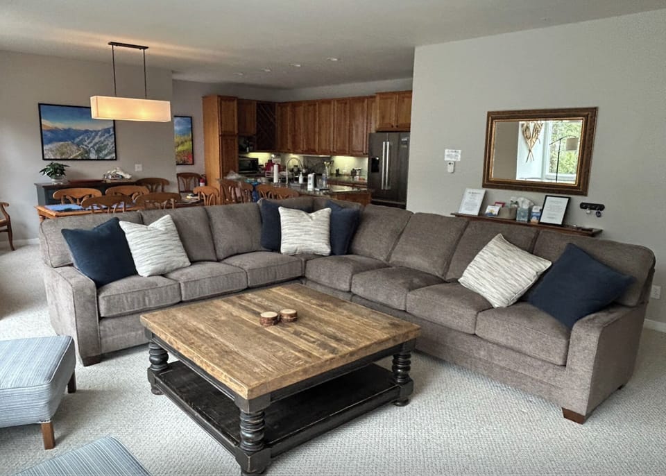 Brand-new sectional sofa in the living room with plenty of space to stretch out, relax, and enjoy time together.