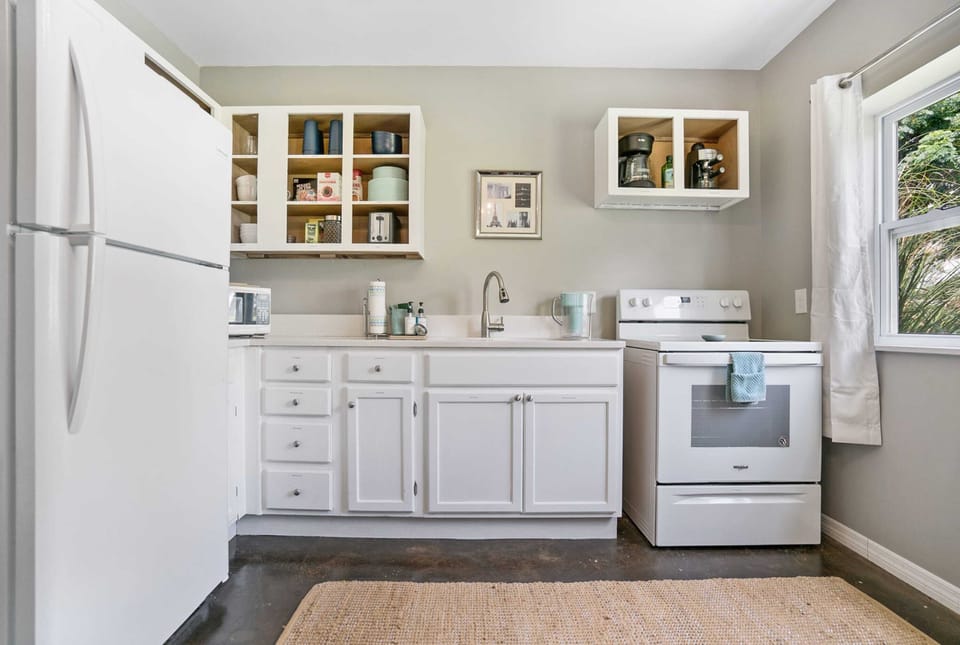 Kitchen has full stove and oven, microwave, drip coffee maker, espresso machine, blender, crock pot and much more!