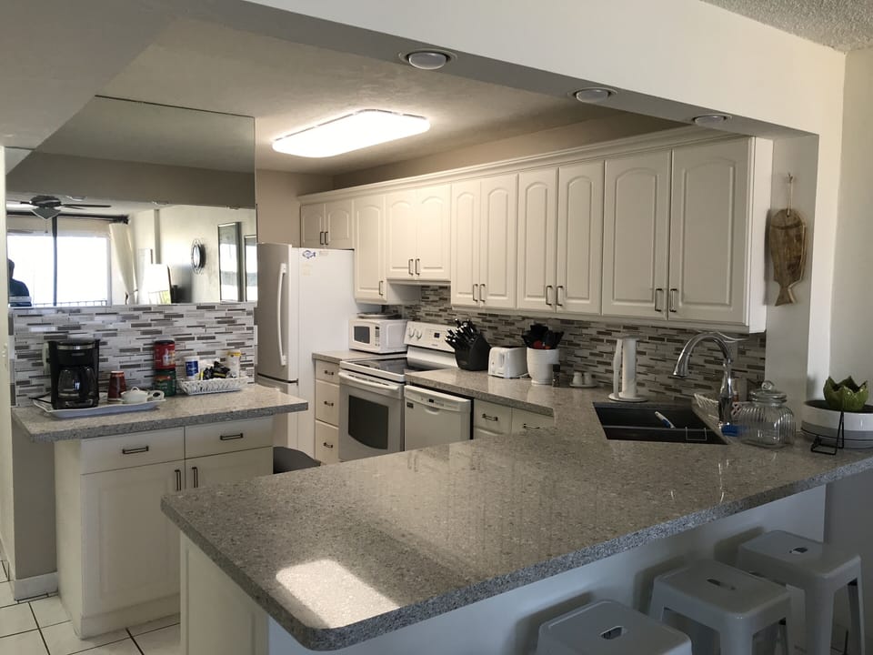Open kitchen with full water view 
