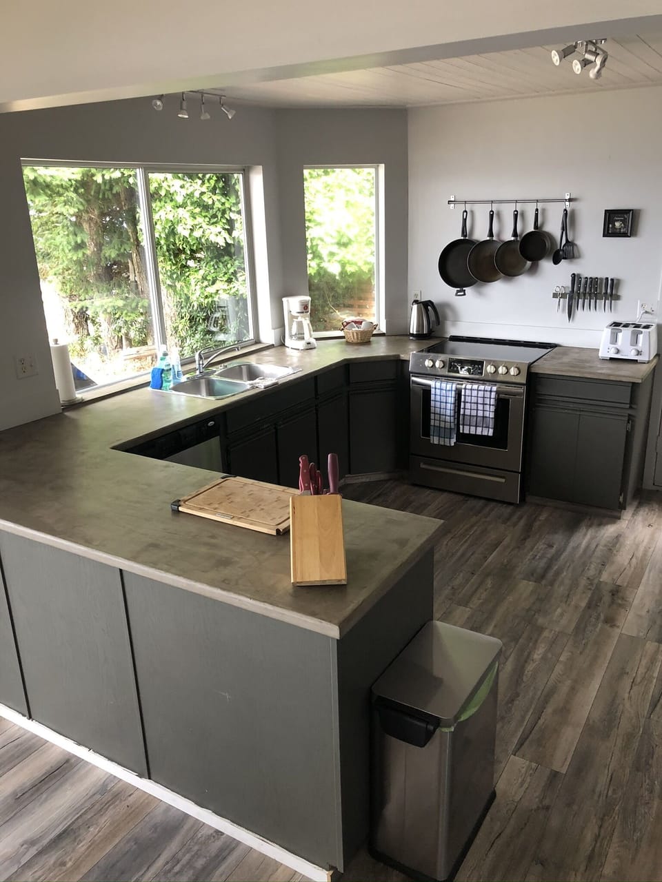 A kitchen with modern appliances and a waterfront view that just cannot be beat.