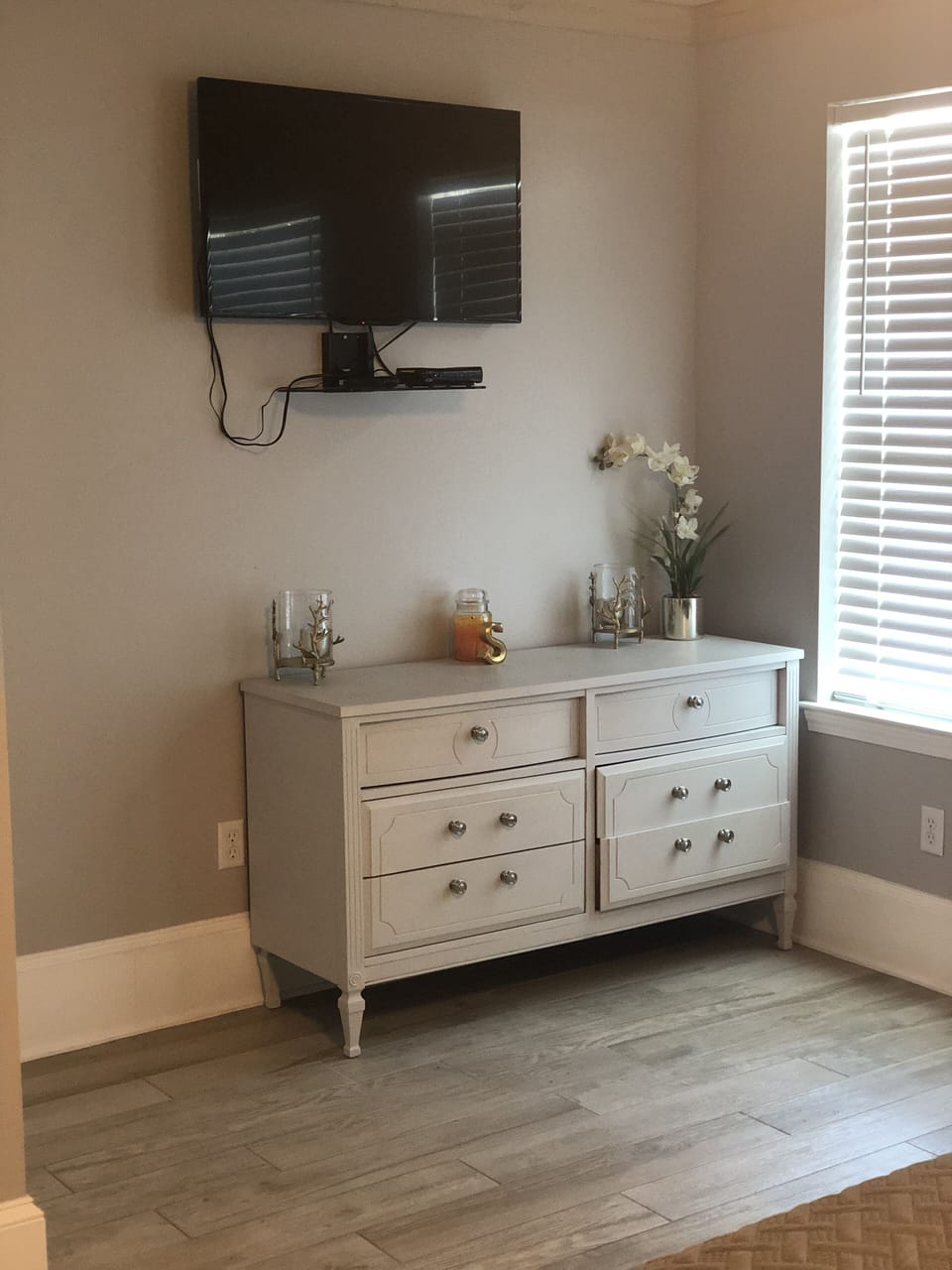 Unpack. Stay awhile. Large dresser in bedroom for all your travel outfits. 