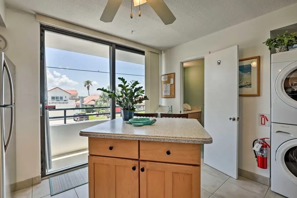 Even the kitchen area has a balcony to watch the afternoon sun fade.