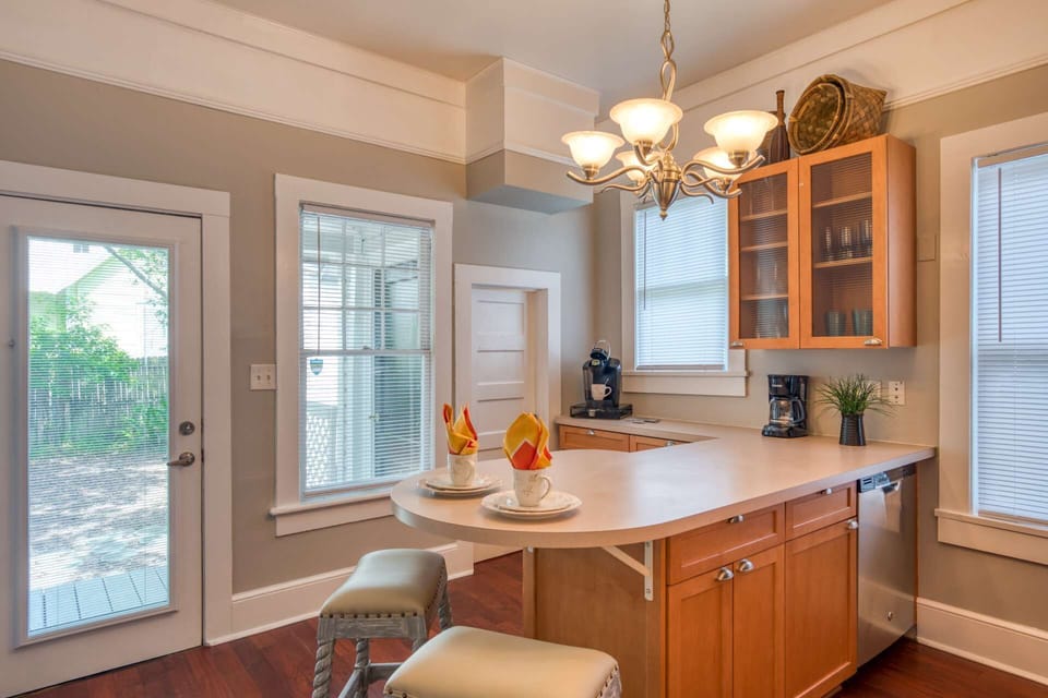 Additional seating is provided at the breakfast bar.