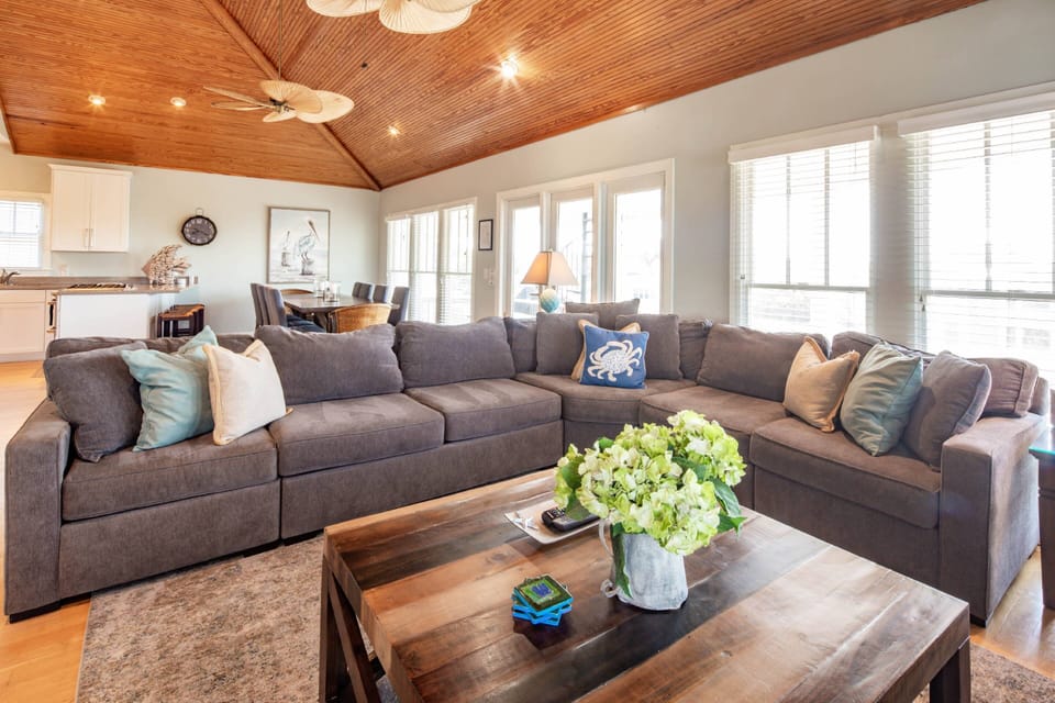 The living room opens into the kitchen and dining area.  You can also access the covered back porch from this room.