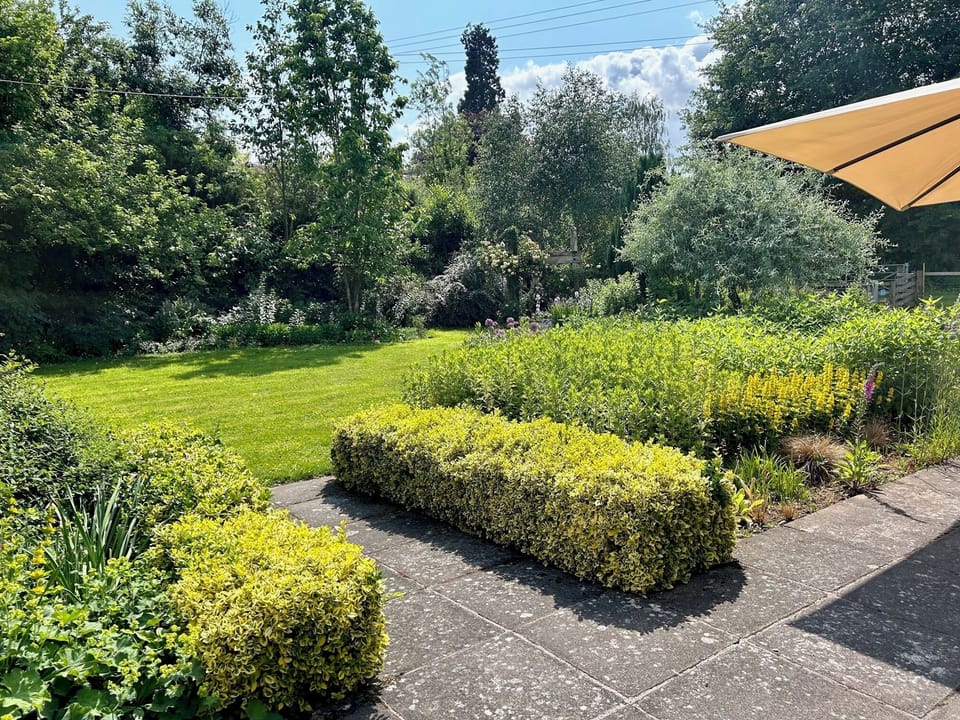 The large  beautiful and private garden at The Cider Mill