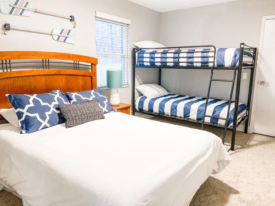 Upstairs BR with Queen and bunks for the kids.