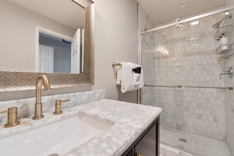 Dwn Master bath with walk in shower- completely updated.