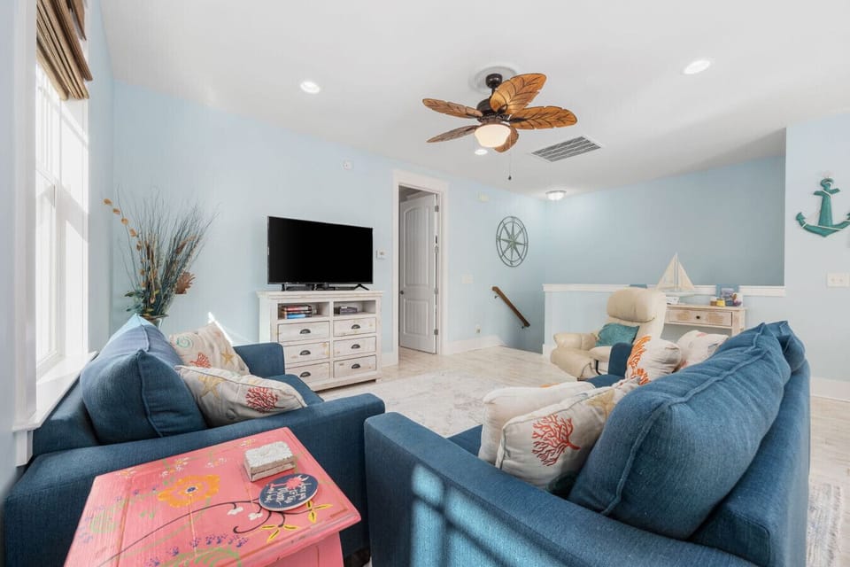 The living room has a cozy, homey feel... an inviting spot where you`ll want to put your feet up.