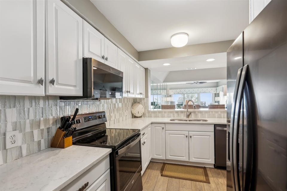 Kitchen with Stainless Steel Appliances at 468 Captains Walk