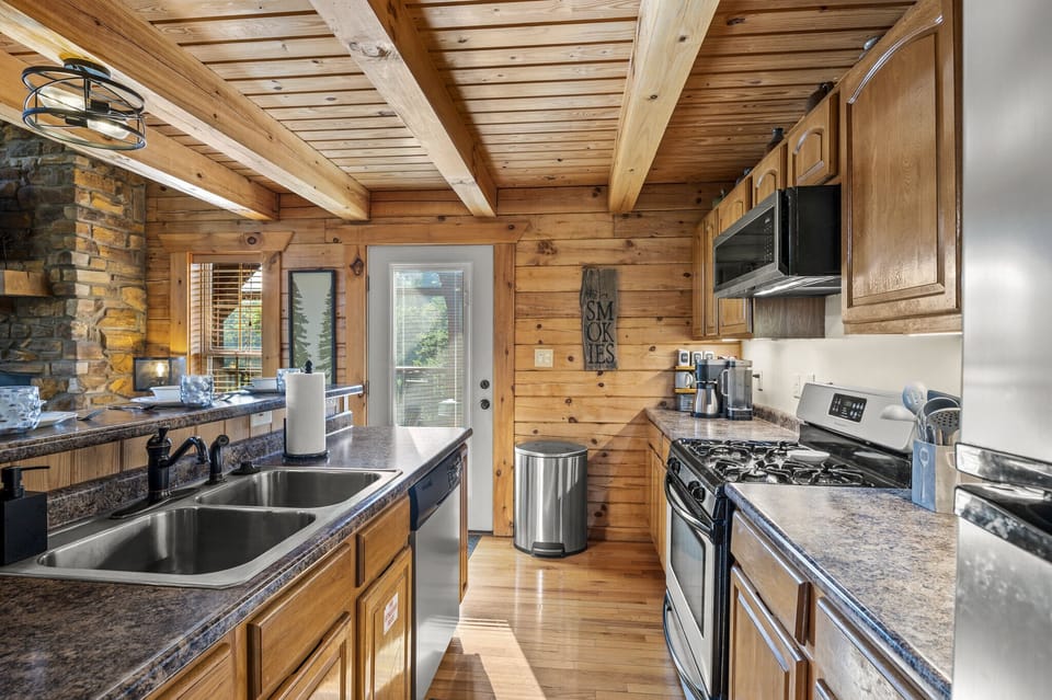Well stocked kitchen with everything you need to cook, bake, toast and brew.