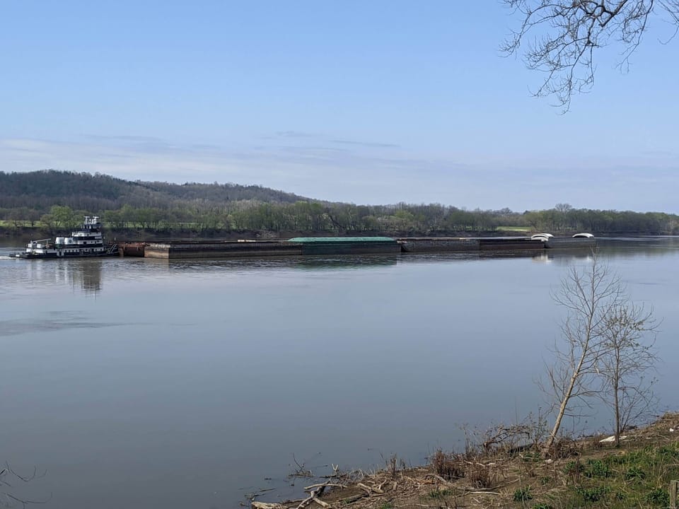Barges drive by all the time on the river and the kids love it!