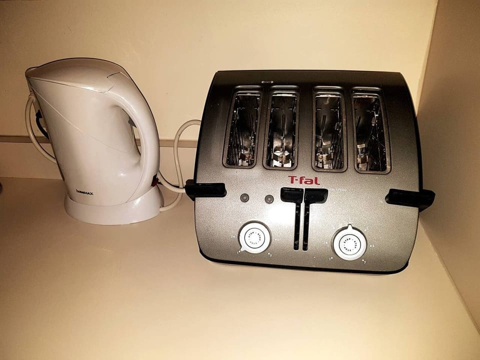 Small appliances provided for your convenience.