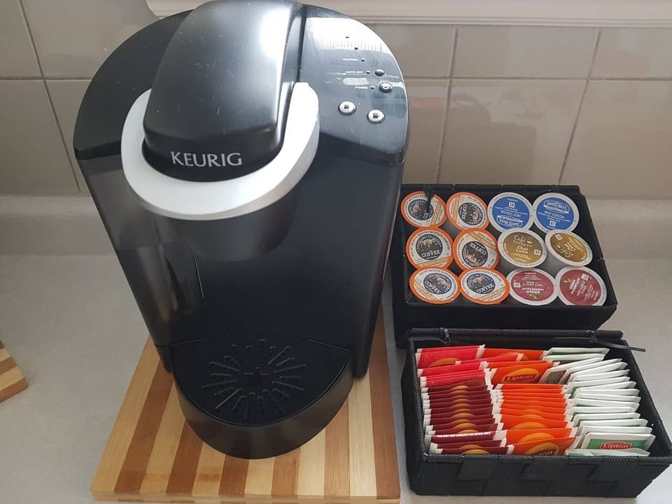 Keurig machine provided with a various assortment of coffees and teas. Come in and relax or kick start your day... up to you.