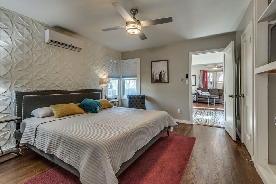 King size tempurpedic bed and TV in bedroom