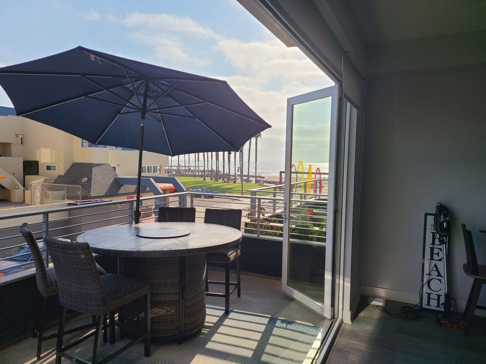 Patio Table and fire pit with umbrella