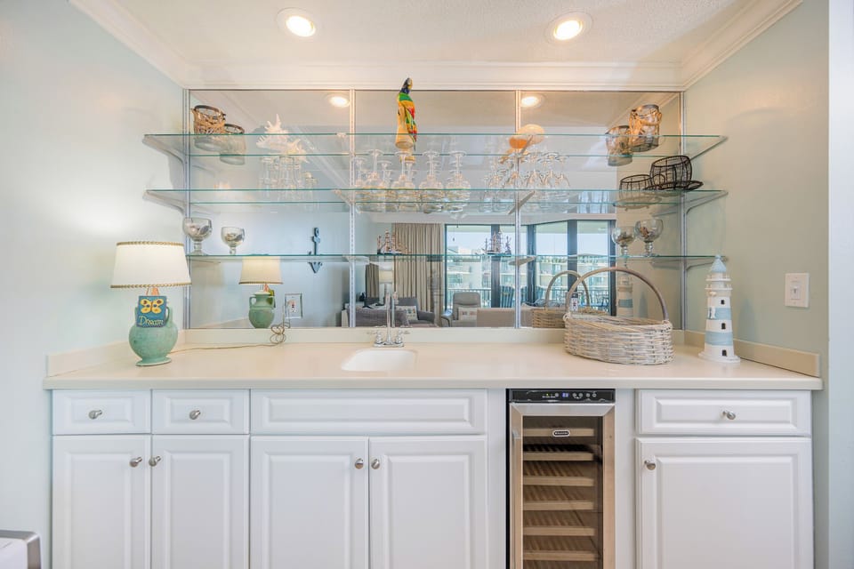 Grab a chilled bottle from the wine cooler or create your favorite cocktail at the wet bar