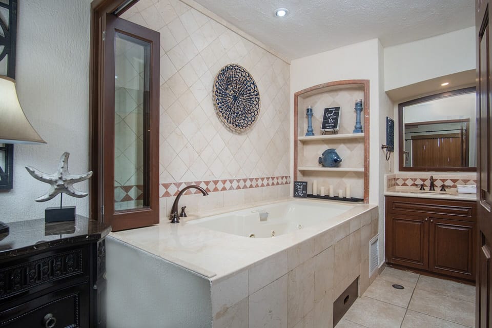 main bathroom with jacuzzi tub