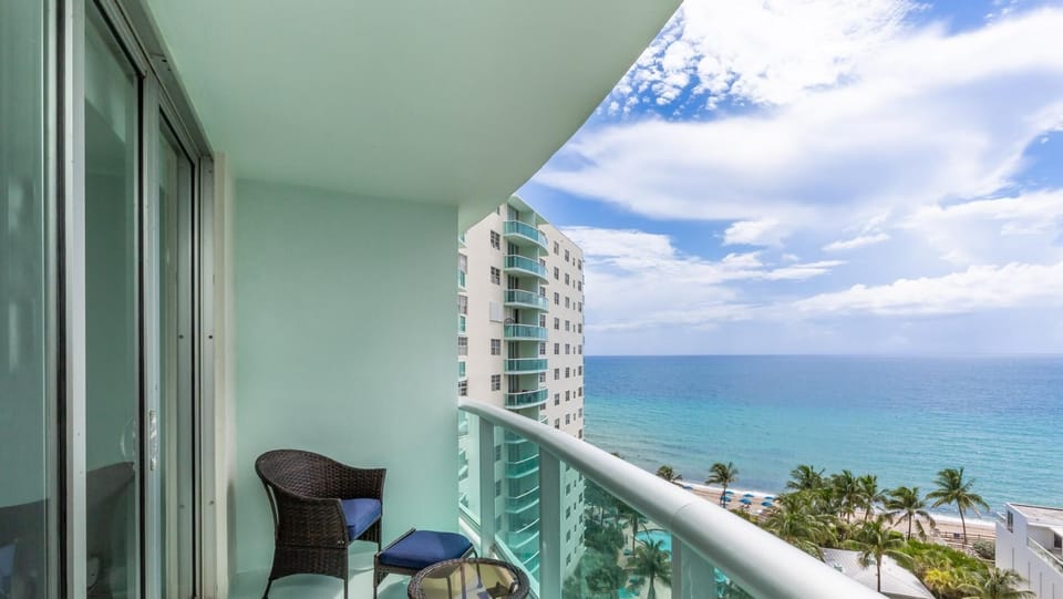 Ocean whispers calling! Your private balcony retreat.