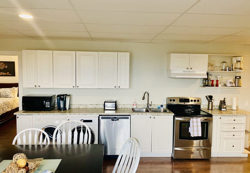 Kitchen is fully stocked including washer and dryer. 