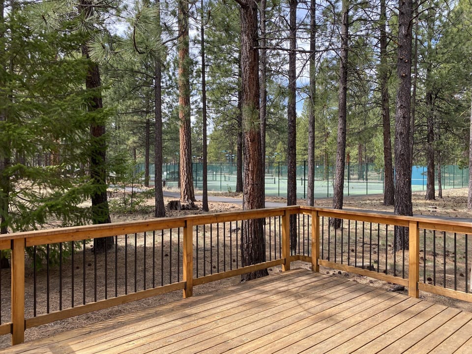 Deck facing tennis courts.