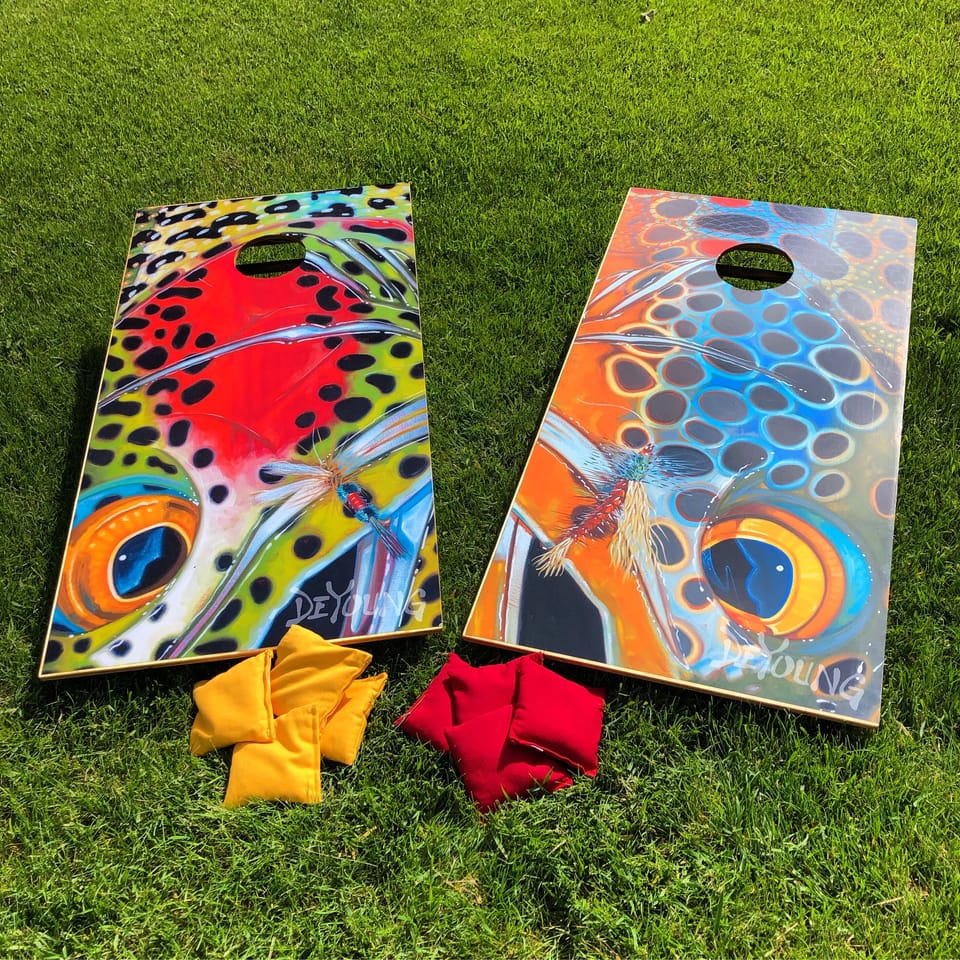 play a game of corn hole