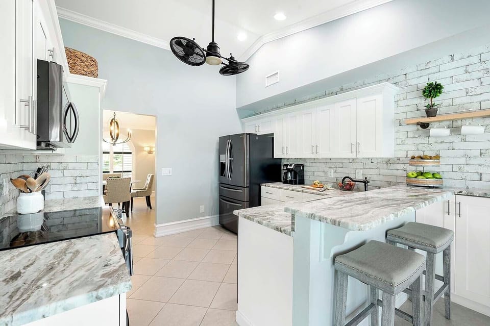 Kitchen with Stainless Appliances and Fully Stocked