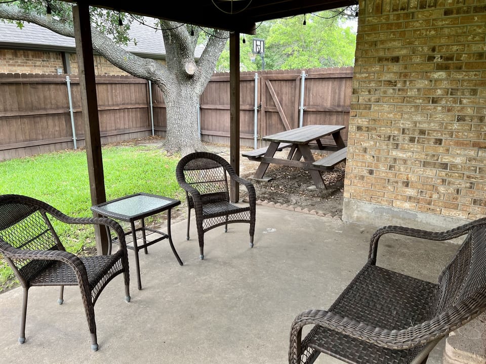 Relax or picnic on the back patio while the kids play soccer or football.