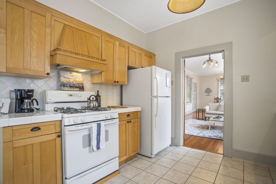 The kitchen has everything you need to cook on the gas stove.