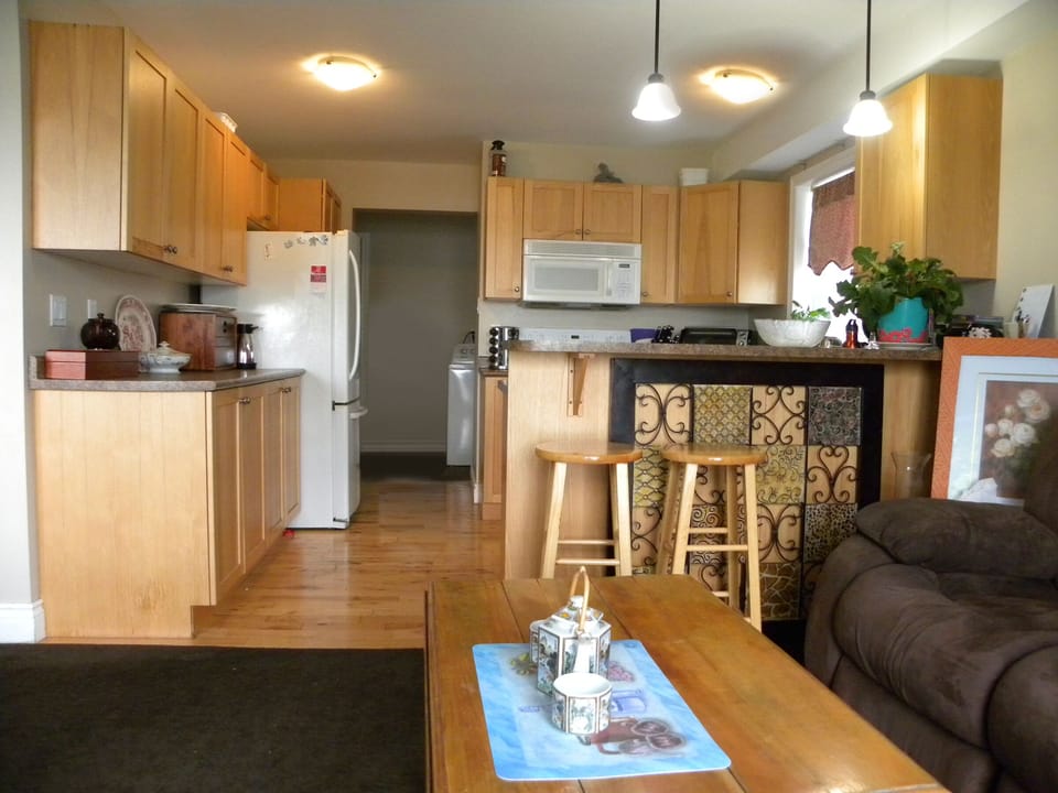 Sitting area next to kitchen and dining room.
