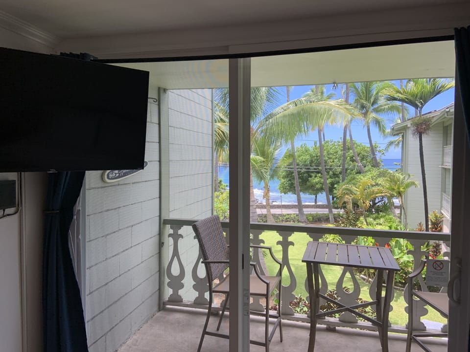 Wall mounted TV, blackout curtains, nonstop Ocean and wild life views