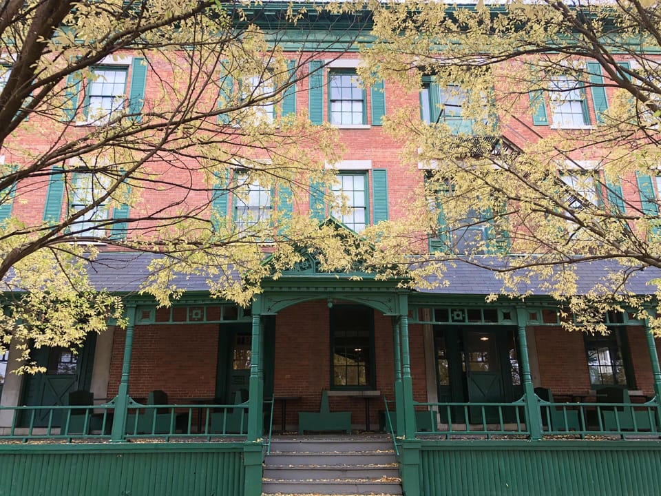 Historic facade with fall foliage