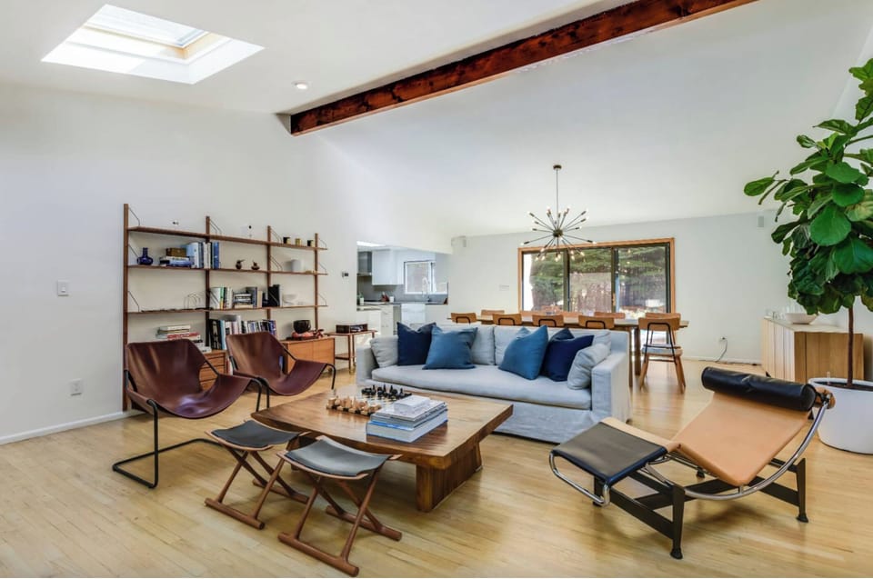 Living Room with 75" TV and Sonos Surround Sound.