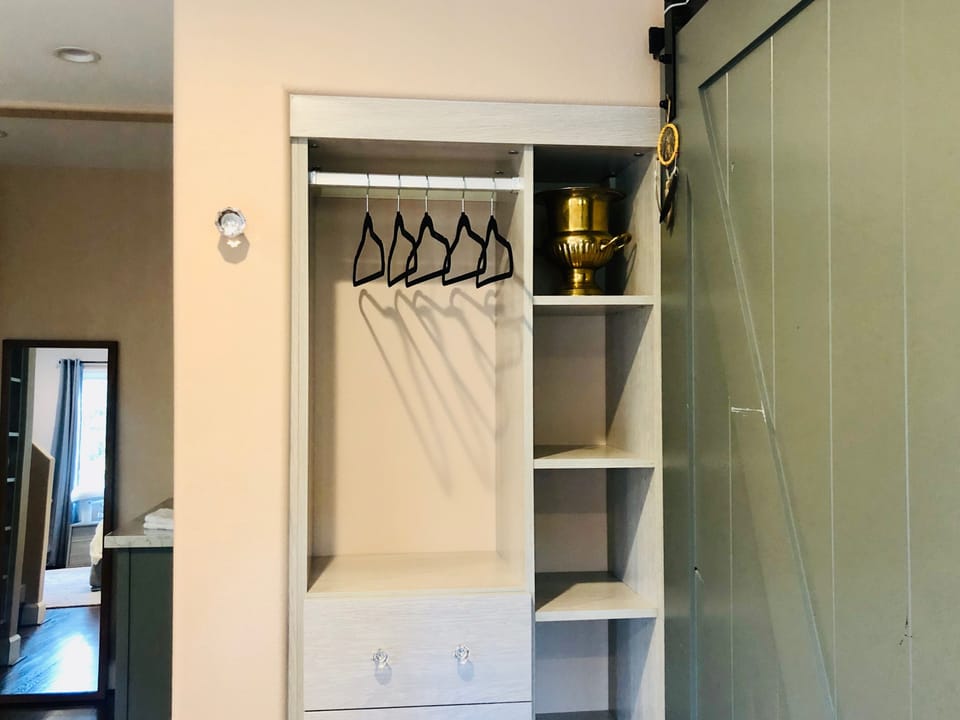 A space to hang clothes and extra drawers.