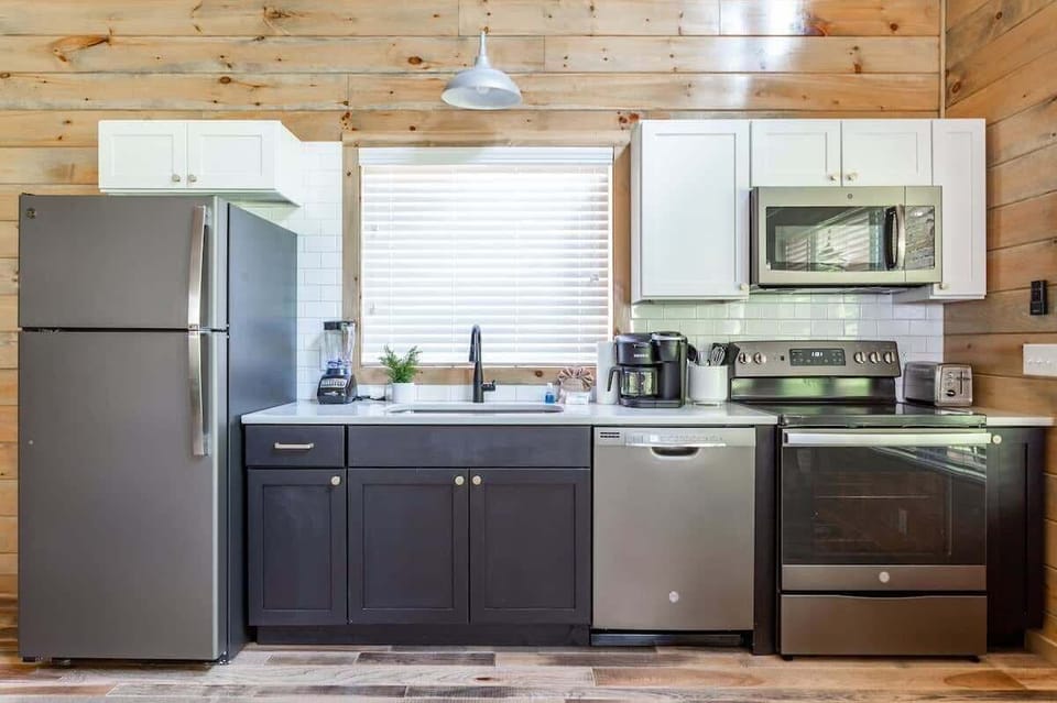 Custom Kitchen With Quartz And Stainless Steel Appliances!