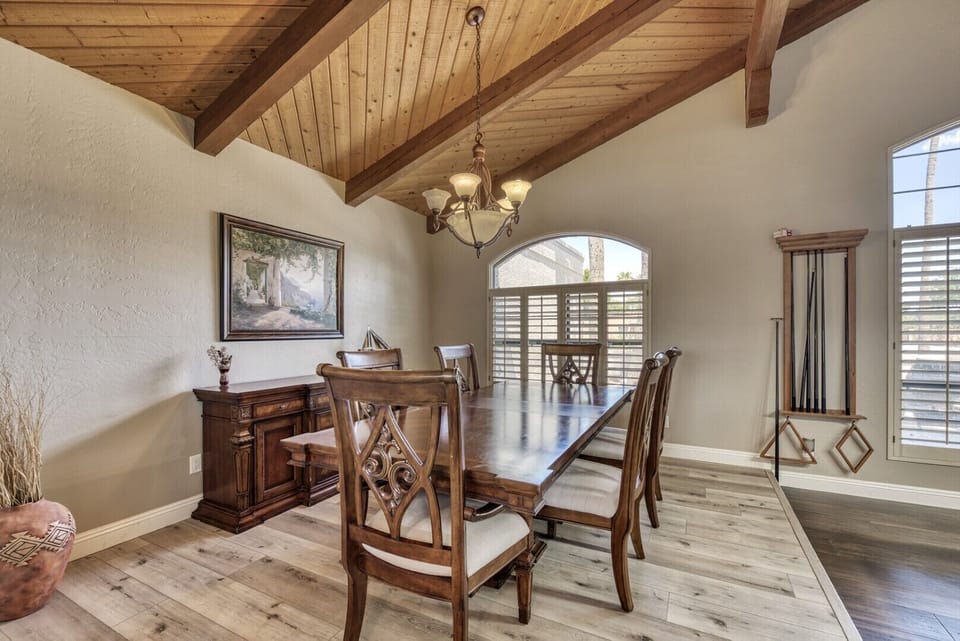 Vaulted dining room.  Dining table with plenty of seating
