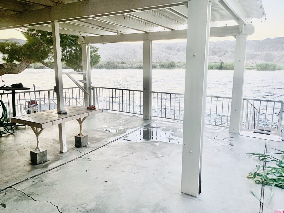 lower deck with one gate to dock and other to river access