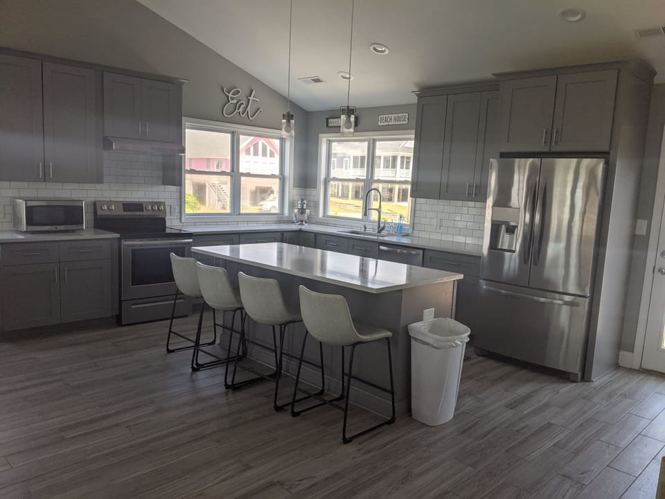 New cabinets with quartz counter-tops and soft-close cabinets.