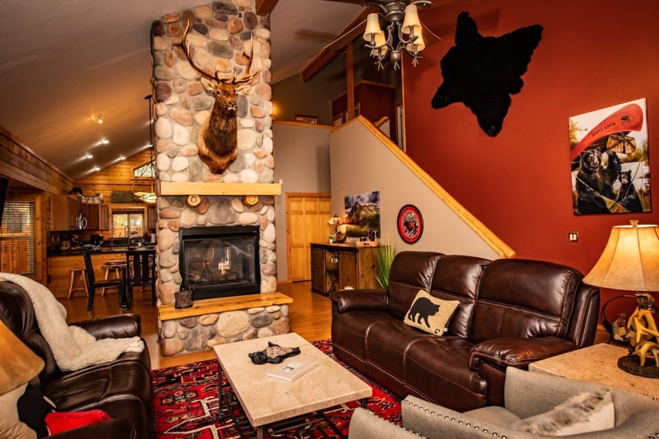 Upon entry is the cozy living room w/ a stunning River Rock gas fireplace and staircase. Ahead is the dining room and fully equipped kitchen & laundry